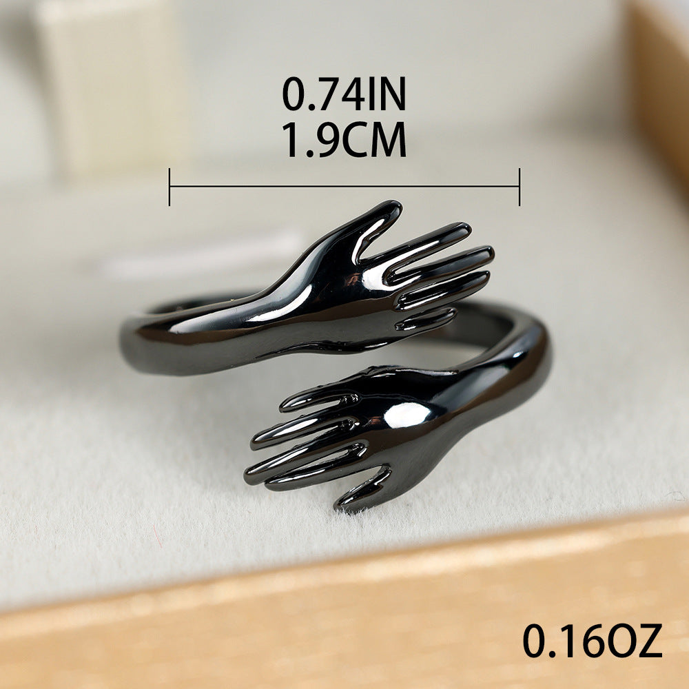Couples Rings With Palms Spread Wide
