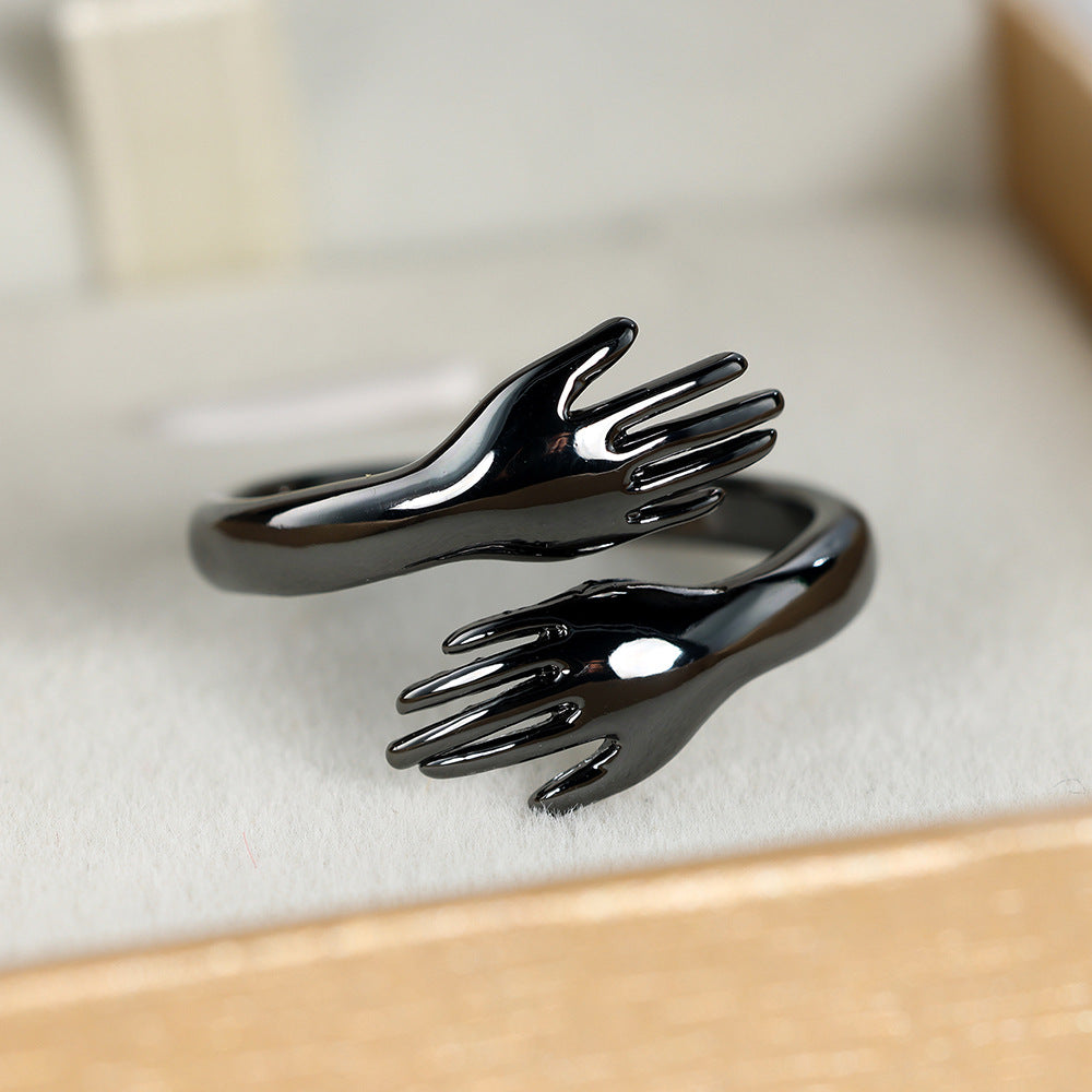 Couples Rings With Palms Spread Wide