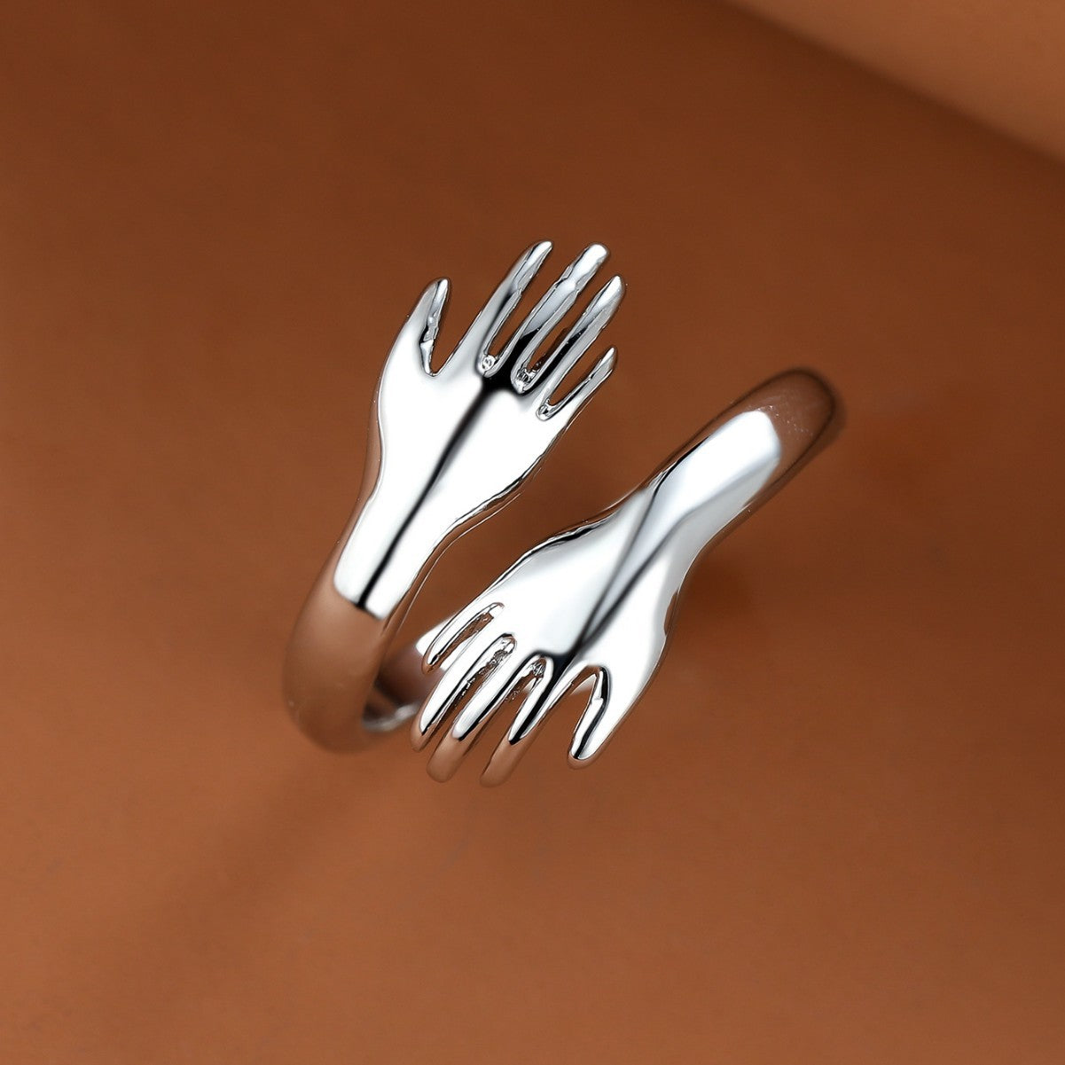 Couples Rings With Palms Spread Wide