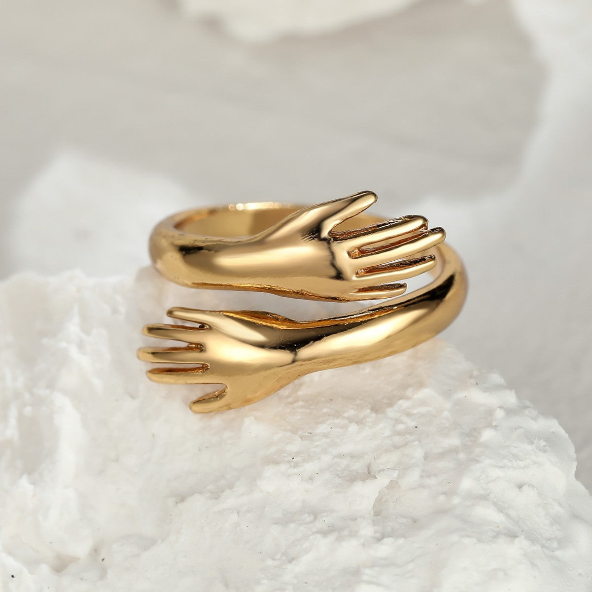 Couples Rings With Palms Spread Wide