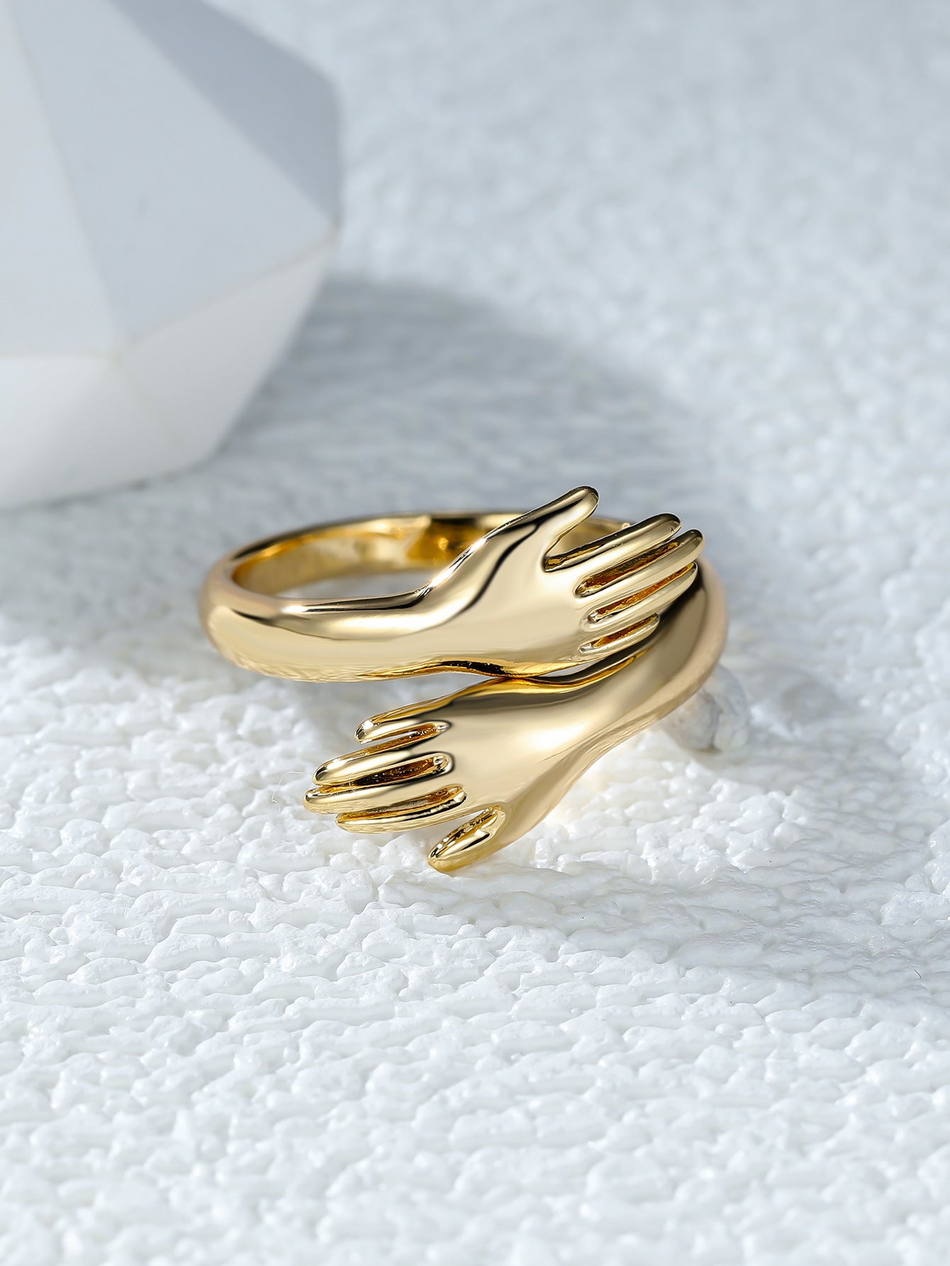 Couples Rings With Palms Spread Wide